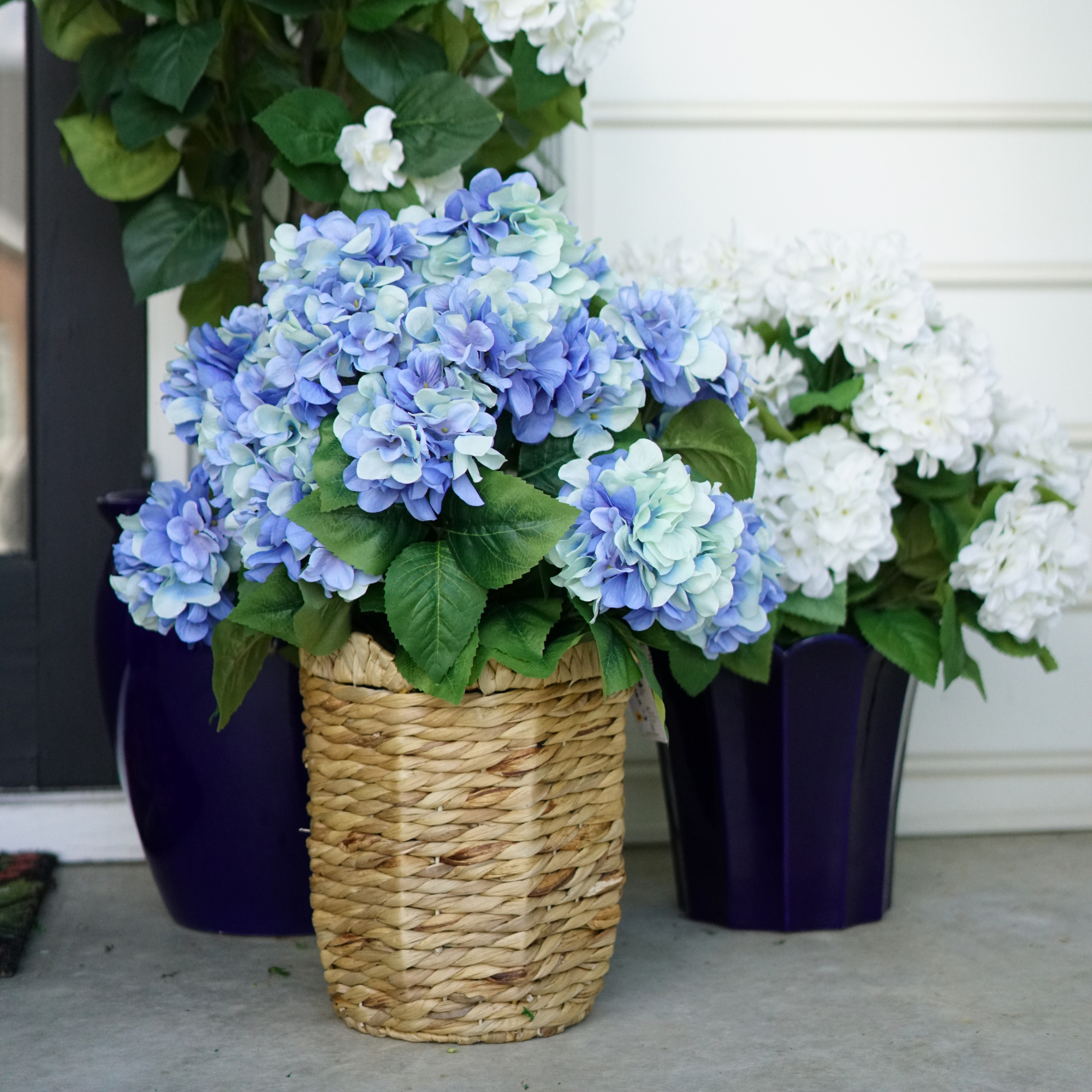 32" Faux Blue Hydrangea Bush in Natural Hyacinth Scalloped Basket