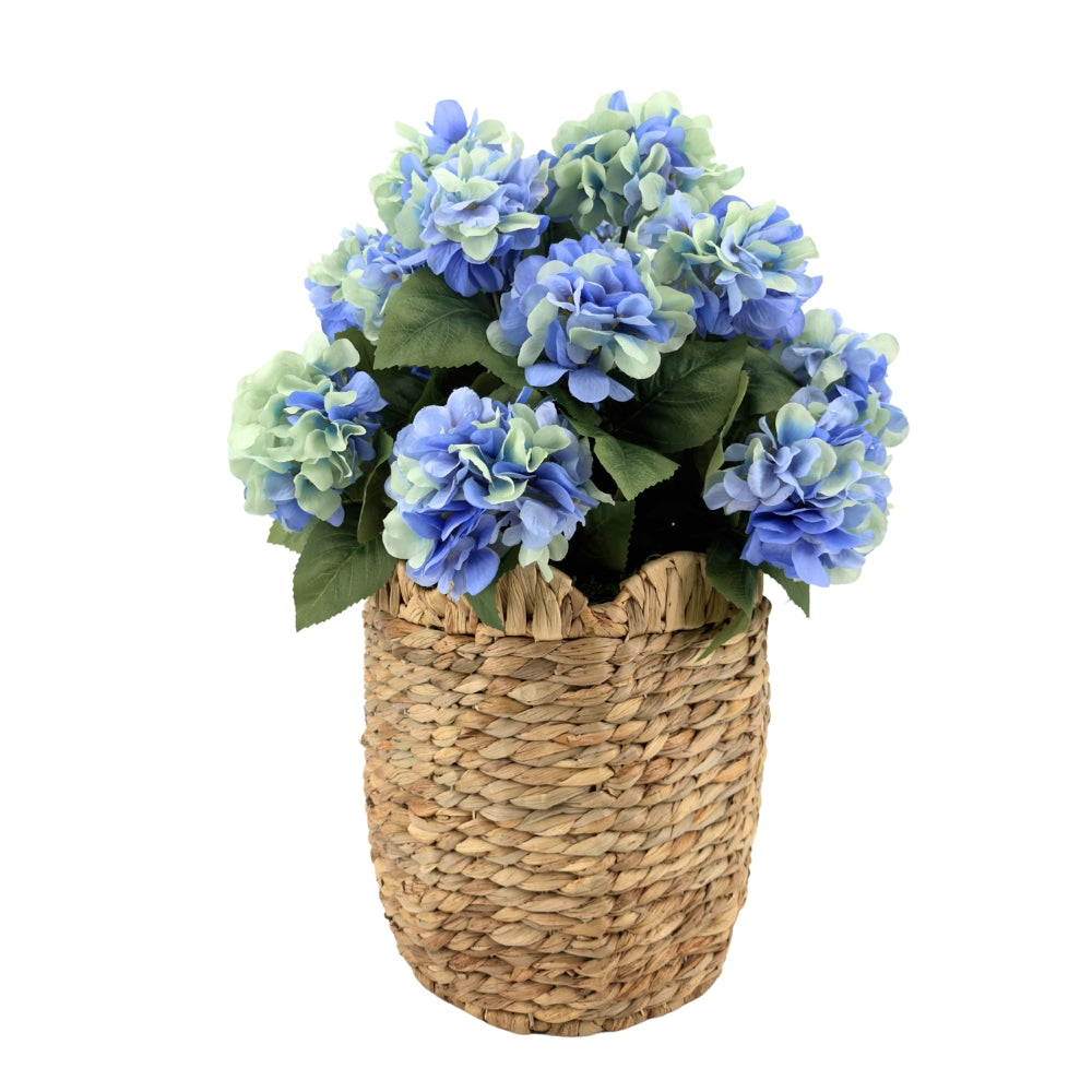 Faux Blue Hydrangea Flower Arrangement in a Scalloped Hyacinth Basket against a white background, by House of Silk Flowers.