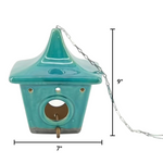 Turquoise birdhouse with dimensions on a white background