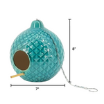 Teal textured birdhouse with a metal chain and measurements on a white background