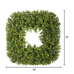 Artificial boxwood wreath with dimensions on a white background