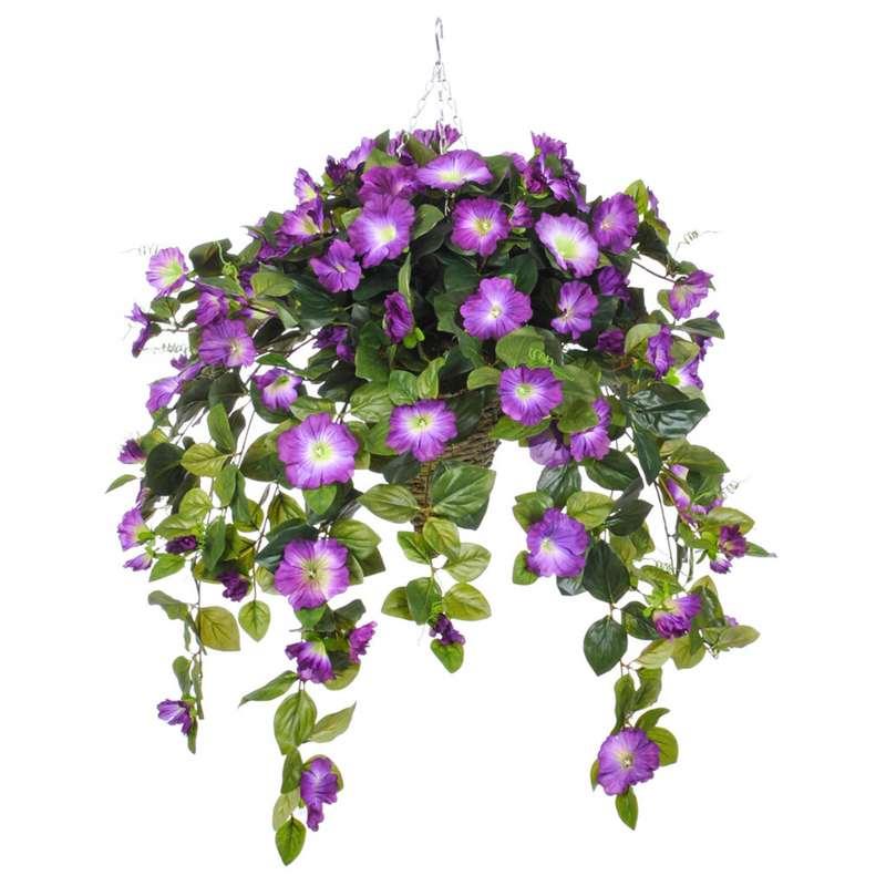 Artificial hanging basket with purple flowers and green leaves on a white background