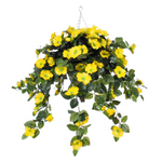 Artificial hanging plant with yellow flowers on a white background