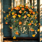Hanging basket with orange and yellow flowers against a wooden background