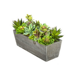 Faux succulent plants in a rectangular wooden planter on a white background