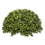 Artificial boxwood ball against a white background