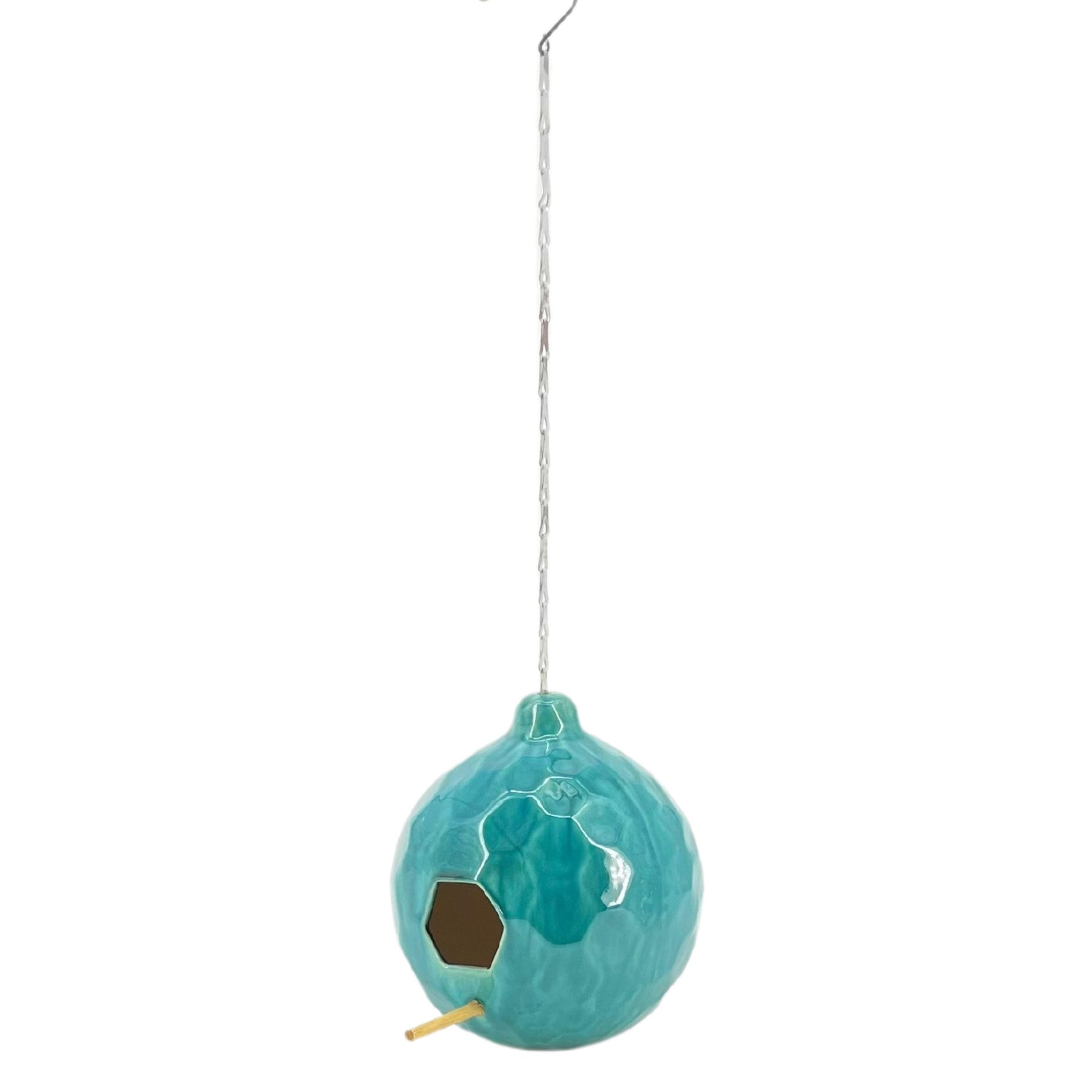 Turquoise birdhouse with chain on a white background