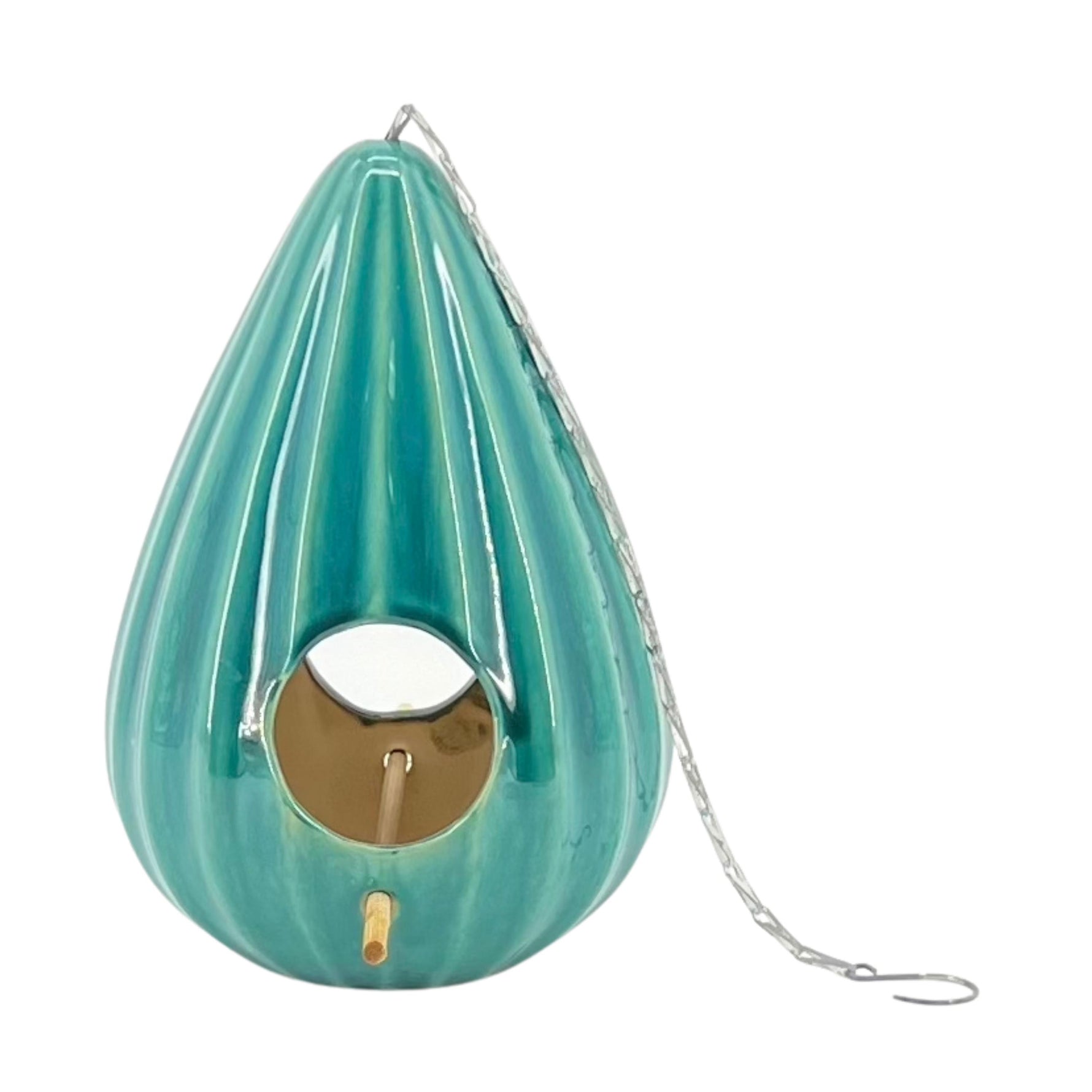 A red ceramic teardrop-shaped birdhouse with a ruffled design, featuring two large openings, a metal chain for hanging, and a gold-colored interior.